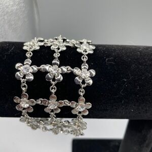 Cookie Lee Silver Tone Rhinestone Floral Grid Wide Cuff Toggle Bracelet